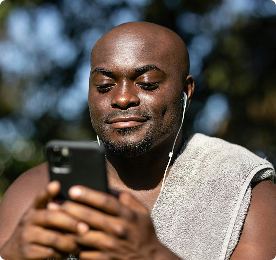 Nexora agent smiling while using their phone